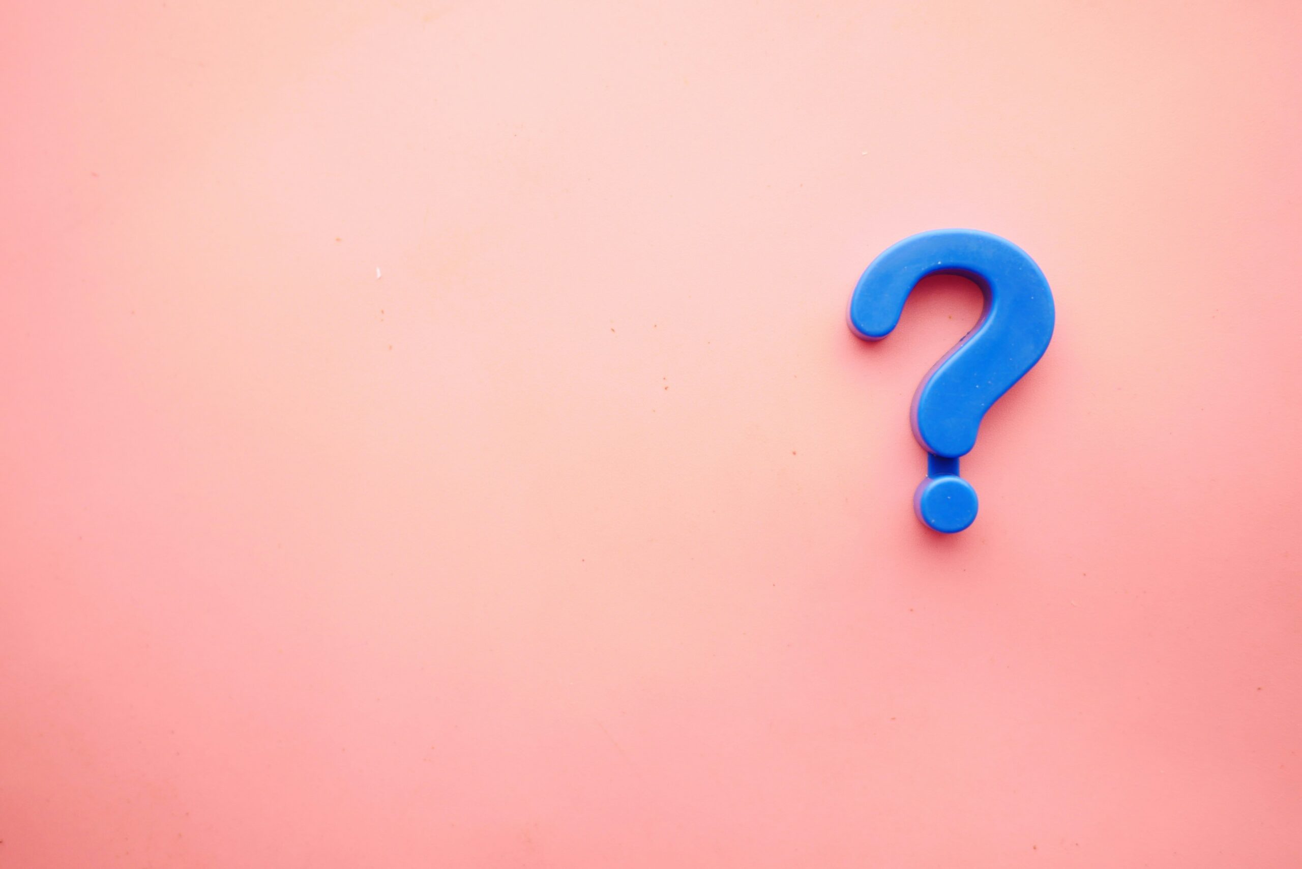 Question mark on pink background